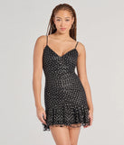 Make a bold statement in the Sparkly Night Polka Dot Glitter Mesh Mini Dress in black, the perfect spring dress for weddings, cocktail hours, nights out, and/or seasonal celebrations.