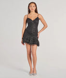 Make a bold statement in the Sparkly Night Polka Dot Glitter Mesh Mini Dress in black, the perfect spring dress for weddings, cocktail hours, nights out, and/or seasonal celebrations.