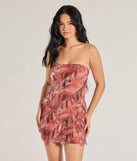 The Blooming Floral Print Ruffled Mesh Mini Dress in red is a modern red dress featuring trendy details and a stunning design ideal for wedding guest dresses, elegant cocktail looks, or an alluring Valentine’s Day dress.