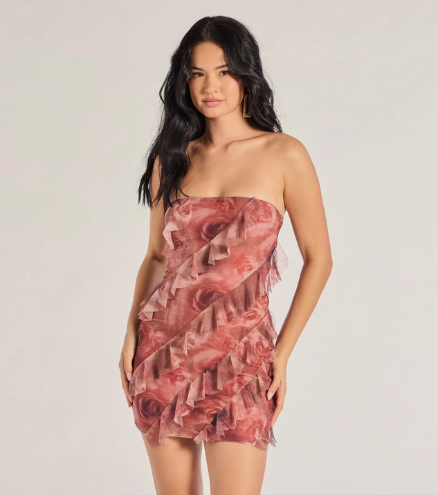The Blooming Floral Print Ruffled Mesh Mini Dress in red is a modern red dress featuring trendy details and a stunning design ideal for wedding guest dresses, elegant cocktail looks, or an alluring Valentine’s Day dress.