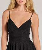 Revamp your 2025 wardrobe with this chic addition, the Show Up Sparkling Glitter Knit Skater Dress in black, perfect for elevating your style in the new year.