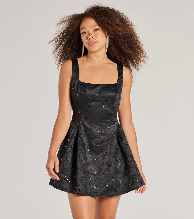 Turn heads in the beaming Glitzy Chic Sequin Woven Drop Waist Skater Dress, a stunning black sequin dress designed to add sparkle and elegance to your next night out or special occasion.