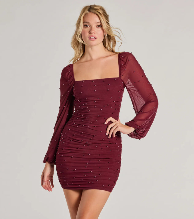 Step into seasonal chic with the Lovely Vibe Pearl Mesh Long Sleeve Mini Dress, a wine mini dress featuring an above-the-knee cut ideal for cocktail parties, festive gatherings, or clubwear.