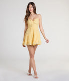 Make a bold statement in the Spring Forward Strappy Back Floral Skater Dress in yellow, the perfect spring dress for weddings, cocktail hours, nights out, and/or seasonal celebrations.