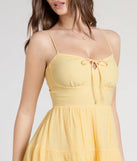 The Spring Forward Strappy Back Skater Dress in yellow brings sleek style to any graduation outfit, from cap and gown to after-party.
