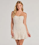 Turn heads in the beaming Charming Radiance Drop Waist Sequin Mini Dress, a stunning ivory sequin dress designed to add sparkle and elegance to your next night out or special occasion.
