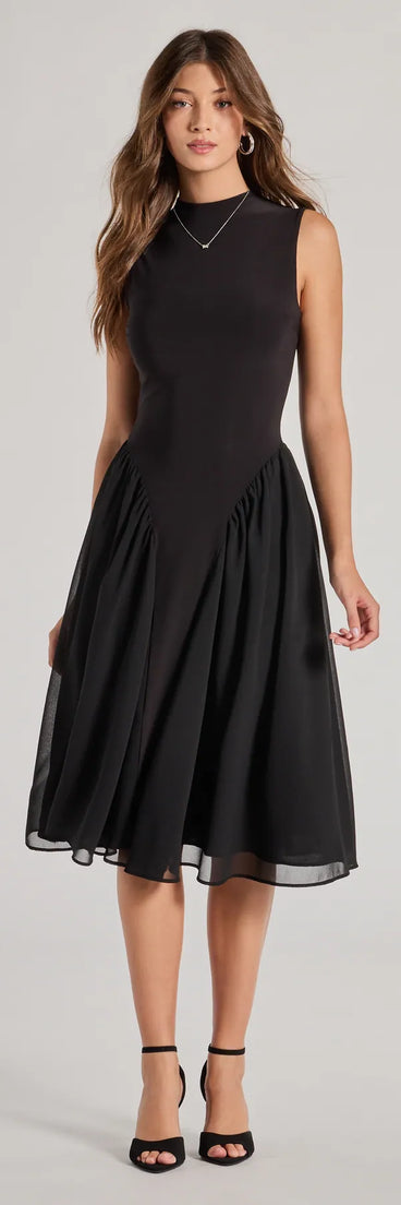 Revamp your 2025 wardrobe with this chic addition, the Chic Trendsetter Knit Chiffon Drop Waist Midi Dress in black, perfect for elevating your style in the new year.