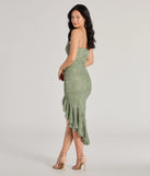 Make a bold statement in the Enchanted Moment Floral Ruffled Lace Midi Dress in sage green, the perfect green dress for weddings, cocktail hours, nights out, and/or seasonal celebrations.