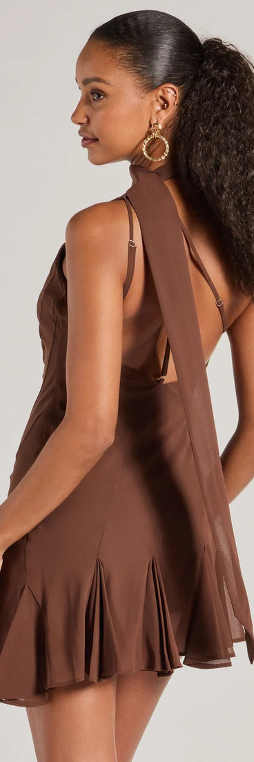 Own every entrance in the Sleek And Elevated Chiffon Scarf Neck Mini Dress, a brown party dress perfect for milestone birthdays and grad parties, or dancing through weekend nights and unforgettable bachelorette celebrations.