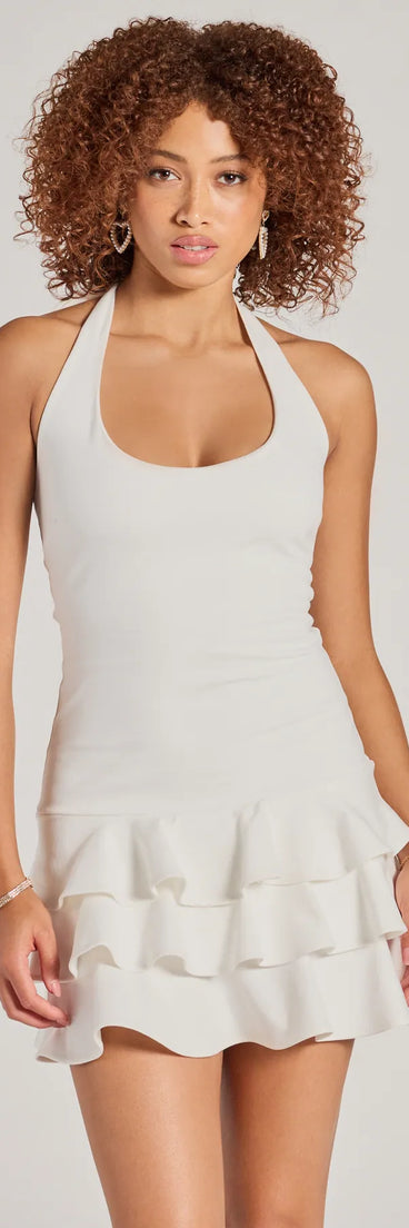 Step into winter chic with the Sweet And Trendy Drop Waist Ruffled Skater Dress, a white mini dress featuring an above-the-knee cut ideal for cocktail parties, festive gatherings, or clubwear.