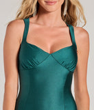Make a bold statement in the Sleek Style High Slit Bodycon Midi Dress in hunter green, the perfect green dress for weddings, cocktail hours, nights out, and/or seasonal celebrations.
