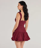 Revamp your 2025 wardrobe with this chic addition, the Adorable Aura Drop Waist Bubble Hem Skater Dress in wine, perfect for elevating your style in the new year.