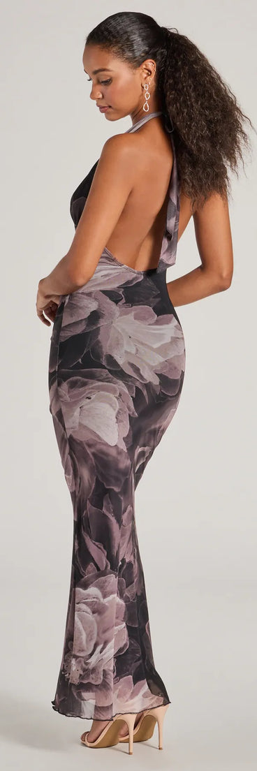 The Drama-Worthy Abstract Floral Mesh Maxi Dress is a stylish black floral dress featuring a fresh seasonal print and flattering design, perfect for garden parties, bridal showers, graduation photoshoots, or everyday spring styling.