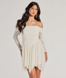 Step into seasonal chic with the Bohemian Chic Lace Off-The-Shoulder Skater Dress, a ivory mini dress featuring an above-the-knee cut ideal for cocktail parties, festive gatherings, or clubwear.