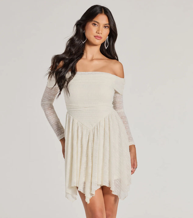 Step into seasonal chic with the Bohemian Chic Lace Off-The-Shoulder Skater Dress, a ivory mini dress featuring an above-the-knee cut ideal for cocktail parties, festive gatherings, or clubwear.