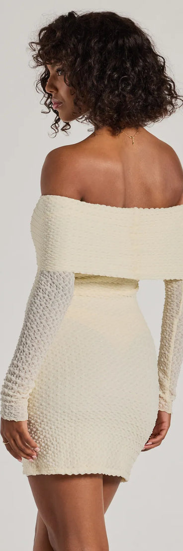 Revamp your 2025 wardrobe with this chic addition, the Trendy Textures Long Sleeve Mini Dress in ivory, perfect for elevating your style in the new year.