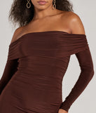 Make a bold statement in the Casual Affair Long Sleeve Ruched Midi Dress in brown, the perfect spring dress for weddings, cocktail hours, nights out, and/or seasonal celebrations.