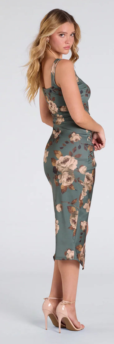 The Pretty Petals Floral Bodycon Slit Midi Dress in sage green features a flattering fit and mid-calf hem, redefining effortless midi dresses for any occasion.