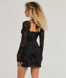 The Chic Touch Long Sleeve Flocked Velvet Mini Dress is a mini dress in multi-color, perfect for an above-the-knee party dress or a stylish cocktail look, with a short hemline designed to make a winter statement.