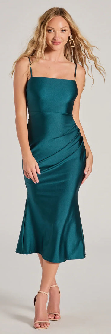 The Endlessly Sleek Sleeveless Knit Midi Dress is a hunter green holiday dress with a festive style, crafted from luxe fabrics and with unique design accents, a perfect pick as your holiday party dress.