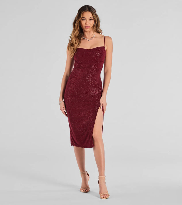 The Glam Radiance High-Slit Glitter Midi Dress in wine is a modern red dress featuring trendy details and a stunning design ideal for wedding guest dresses, elegant cocktail looks, or an alluring Easter dress.