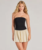 Step into seasonal chic with the On-Trend Vibe Strapless Drop Waist Skater Dress, a black mini dress featuring an above-the-knee cut ideal for cocktail parties, festive gatherings, or clubwear.