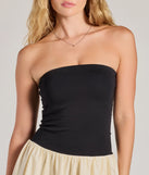 Step into seasonal chic with the On-Trend Vibe Strapless Drop Waist Skater Dress, a black mini dress featuring an above-the-knee cut ideal for cocktail parties, festive gatherings, or clubwear.