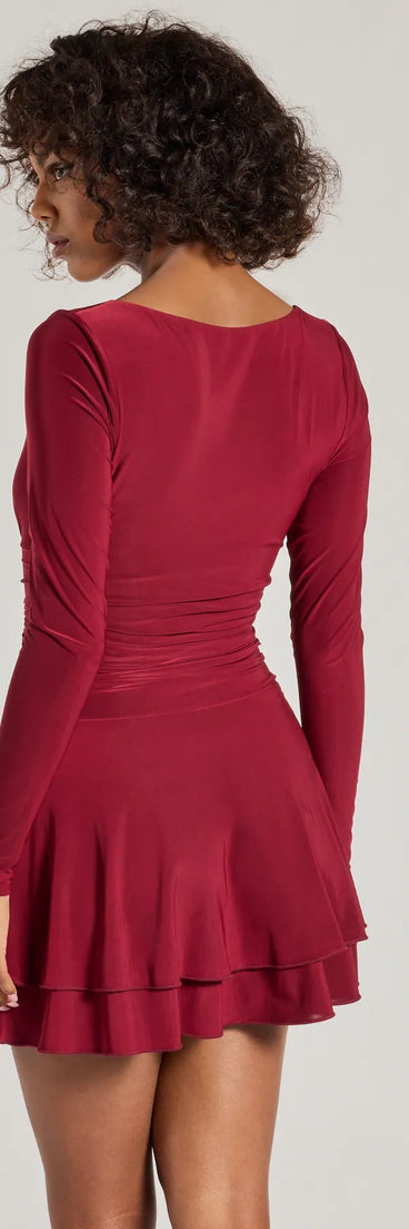 Forever Sweet Long Sleeve Drop Waist Skater Dress in burgundy , a stylish red dress with a flattering fit and fabric that adds allure to your look, perfect for wedding guest attire, cocktail events, or making a bold statement on a date night.