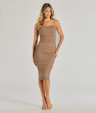 Make a bold statement in the Glam Evenings Corset Rhinestone Mesh Midi Dress in taupe, the perfect spring dress for weddings, cocktail hours, nights out, and/or seasonal celebrations.
