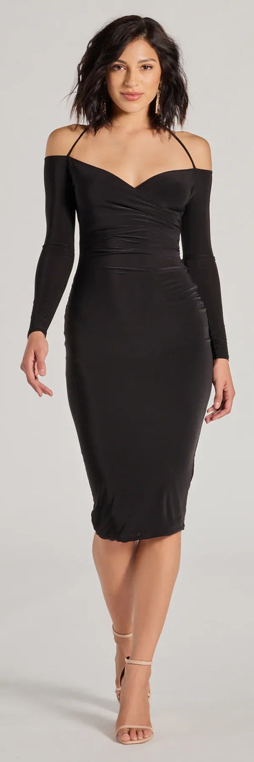 With its mid-calf hem and popular flattering fit, the Strike A Pose Long Sleeve Halter Midi Dress in black nails the balance of trend and ease, redefining go-to midi dresses for any occasion.