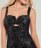 Make a bold statement in the Ravishing Allure Velvet Pattern Ruffle Midi Dress in black, the perfect spring dress for weddings, cocktail hours, nights out, and/or seasonal celebrations.