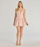 Make a bold statement in the Adorably Mine Corset Lace Trim Skater Dress in pink, the perfect spring dress for weddings, cocktail hours, nights out, and/or seasonal celebrations.