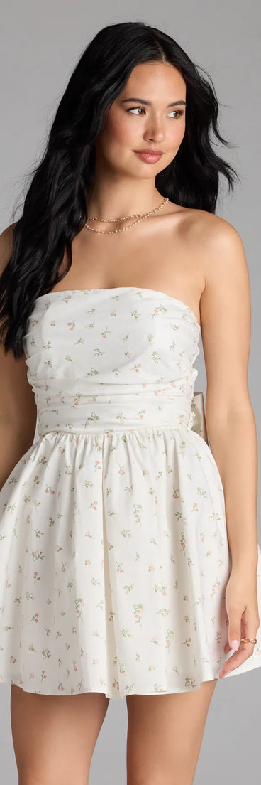 Soak up the season in the Loveliest Of Them All Bow Floral Skater Dress, a white sundress styled for easy days, outdoor plans, and everything in between.