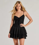 With Love Lace V-Neck Chiffon Skater Dress, a trendy black mini dress featuring modern details and a fresh seasonal hue, perfect for creating chic 2025 looks.