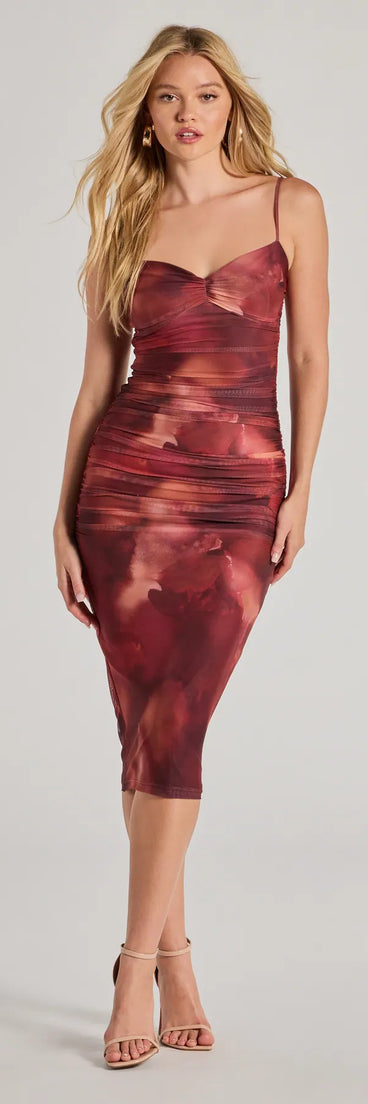 With its mid-calf hem and popular flattering fit, the Romantic Glam Abstract Floral Ruched Midi Dress in maroon nails the balance of trend and ease, redefining go-to midi dresses for any occasion.