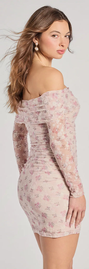 In The Garden Off-The-Shoulder Floral Mesh Mini Dress, a trendy ivory mini dress featuring modern details and a fresh seasonal hue, perfect for creating chic 2025 looks.