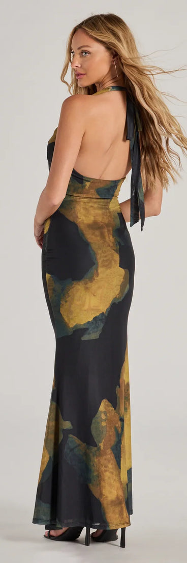 The Work Of Art Abstract Marble Print Maxi Dress is a show-stopping black prom dress, offering a sleek, slimming silhouette that enhances your natural beauty for an unforgettable night.