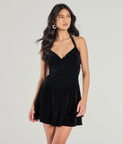 Luxe Muse Halter Velvet Skater Dress, a trendy black mini dress featuring modern details and a fresh seasonal hue, perfect for creating chic 2025 looks.