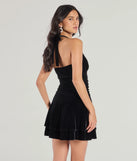 Luxe Muse Halter Velvet Skater Dress, a trendy black mini dress featuring modern details and a fresh seasonal hue, perfect for creating chic 2025 looks.