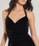Luxe Muse Halter Velvet Skater Dress, a trendy black mini dress featuring modern details and a fresh seasonal hue, perfect for creating chic 2025 looks.
