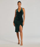 With its mid-calf hem and popular flattering fit, the Sparkling Glam Velvet Glitter Halter Midi Dress in hunter green nails the balance of trend and ease, redefining go-to midi dresses for any occasion.