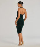 Make a bold statement in the Sparkling Glam Velvet Glitter Halter Midi Dress in hunter green, the perfect green dress for weddings, cocktail hours, nights out, and/or seasonal celebrations.