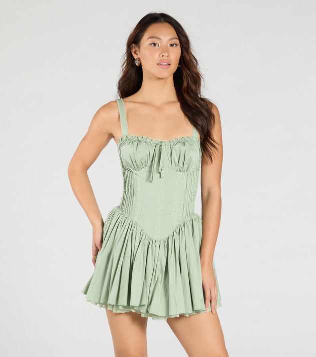 Feel confident and photo-ready in the So Darling Woven Drop-Waist Skater Dress, a sage green graduation dress perfect for 2025 ceremonies and parties.