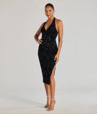 The Refined Charm Flocked Velvet Halter Midi Dress is a stylish black floral dress featuring a fresh seasonal print and flattering design, perfect for garden parties, bridal showers, outdoor concerts, or everyday spring styling.