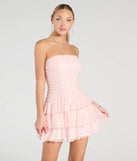 Feel confident and photo-ready in the Lovely Nights Strapless Lace Ruffle Skater Dress, a pink graduation dress perfect for 2025 ceremonies and parties.