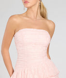 The Lovely Nights Strapless Lace Ruffle Skater Dress is a stylish pink lace dress, designed with intricate lace and an alluring silhouette, making it an elegant choice for graduation photoshoots, weddings, or effortless summer looks.