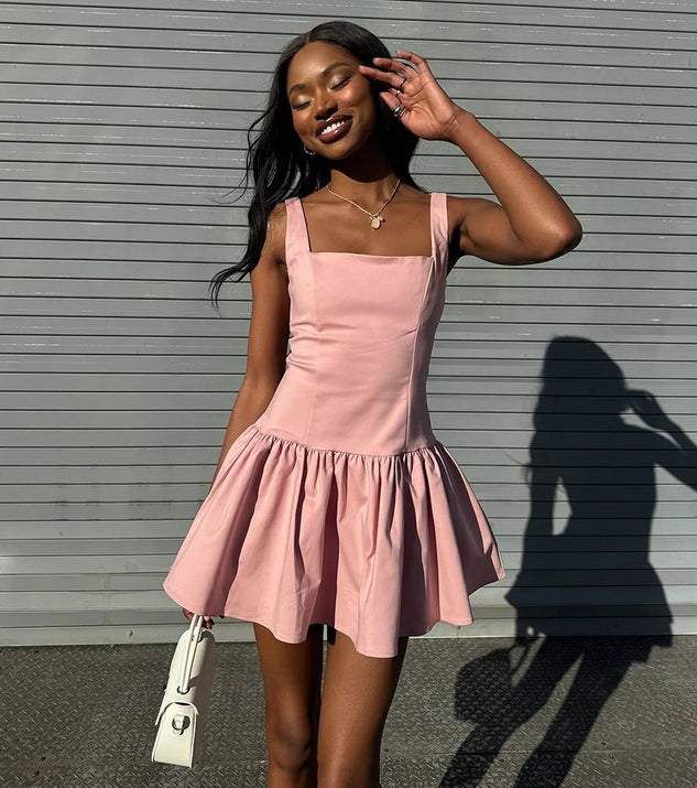 Feel confident and photo-ready in the Isn't She Lovely Sleeveless Ruffle Skater Dress, a pink graduation dress perfect for 2025 ceremonies and parties.