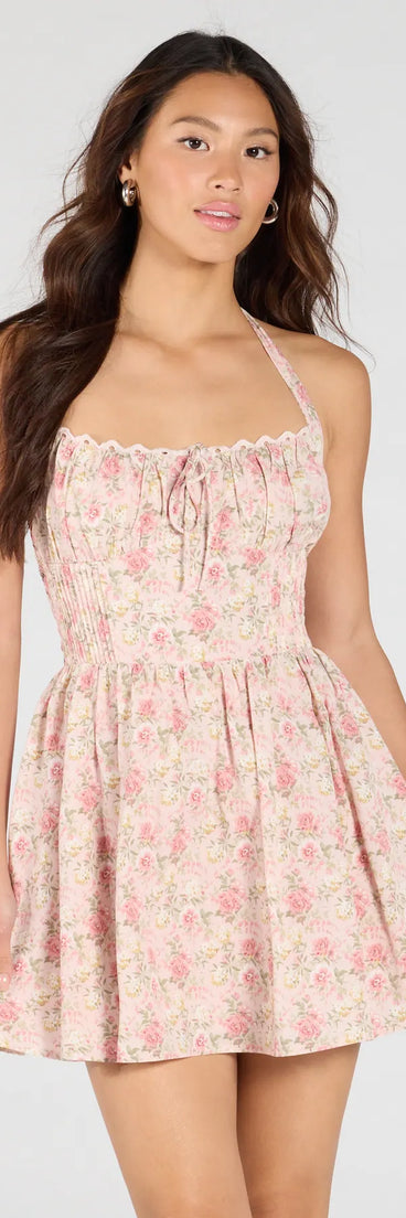 Make a bold statement in the Twirling Beauty Halter Floral Skater Dress in pink, the perfect spring dress for weddings, cocktail hours, nights out, and/or seasonal celebrations.