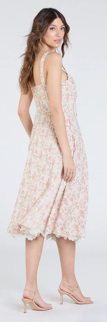 Make a bold statement in the Captivating Blooms Corset A-Line Floral Midi Dress in ivory, the perfect spring dress for weddings, cocktail hours, nights out, and/or seasonal celebrations.