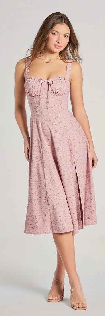 With its mid-calf hem and popular flattering fit, the Sweet Spice Corset Lace-Up Floral Midi Dress in pink nails the balance of trend and ease, redefining go-to midi dresses for any occasion.